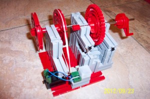 This example is a hand crank powered generator he created. As you will see in this picture and those that follow, Zachery is using some of the ‘old-school’ red and grey fischertechnik blocks he was able to get his hands on. (Please note that while the colors have changed over the years, the functionality has not, and he will be able to easily expand on what he has by using any of the current fischertechnik parts, as well as the updated and enhanced controllers, sensors and other electronic parts.) 